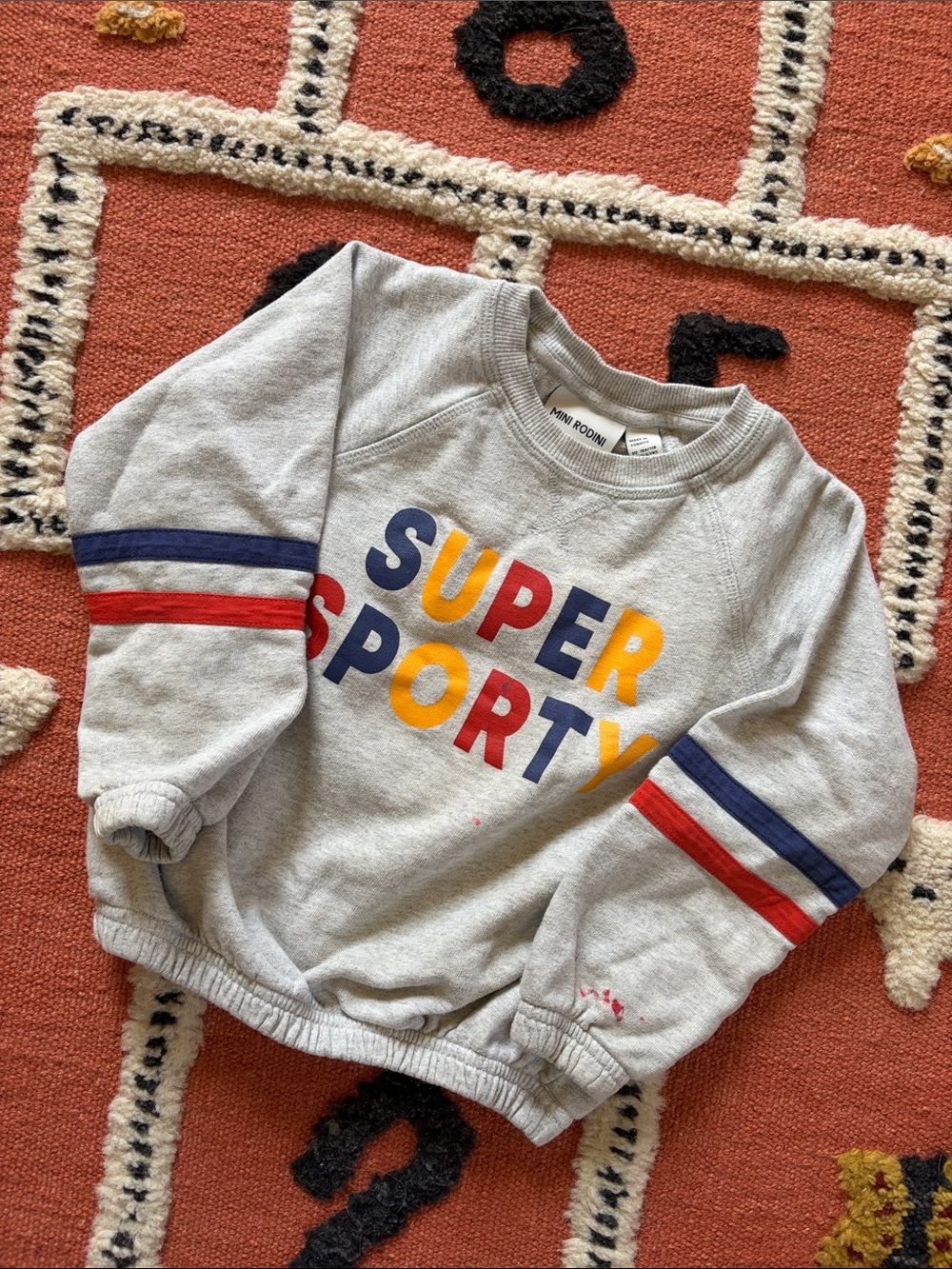 Mini Rodini Grey 'Super Sporty' Kids Sweatshirt with Red & Blue Accents